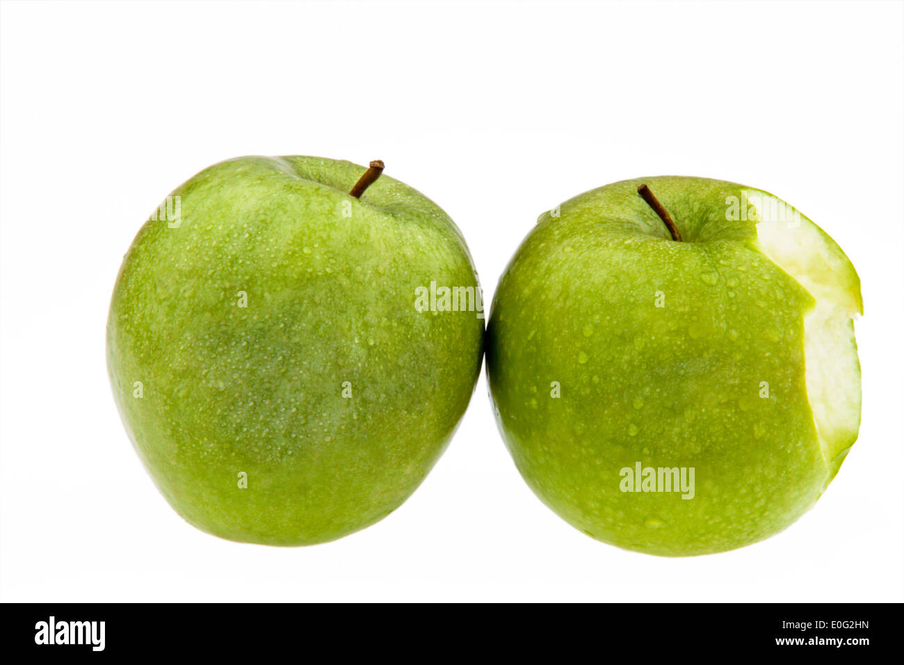 A bitten into apple on wei ? ?em background, Ein Angebissener Apfel auf weißem Hintergrund Stock Photo