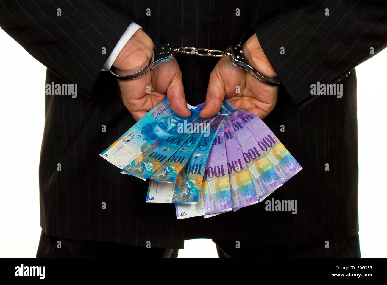 Manager with Swiss franc of bank notes in the hand, Manager mit Schweizer Franken Geldscheinen in der Hand Stock Photo