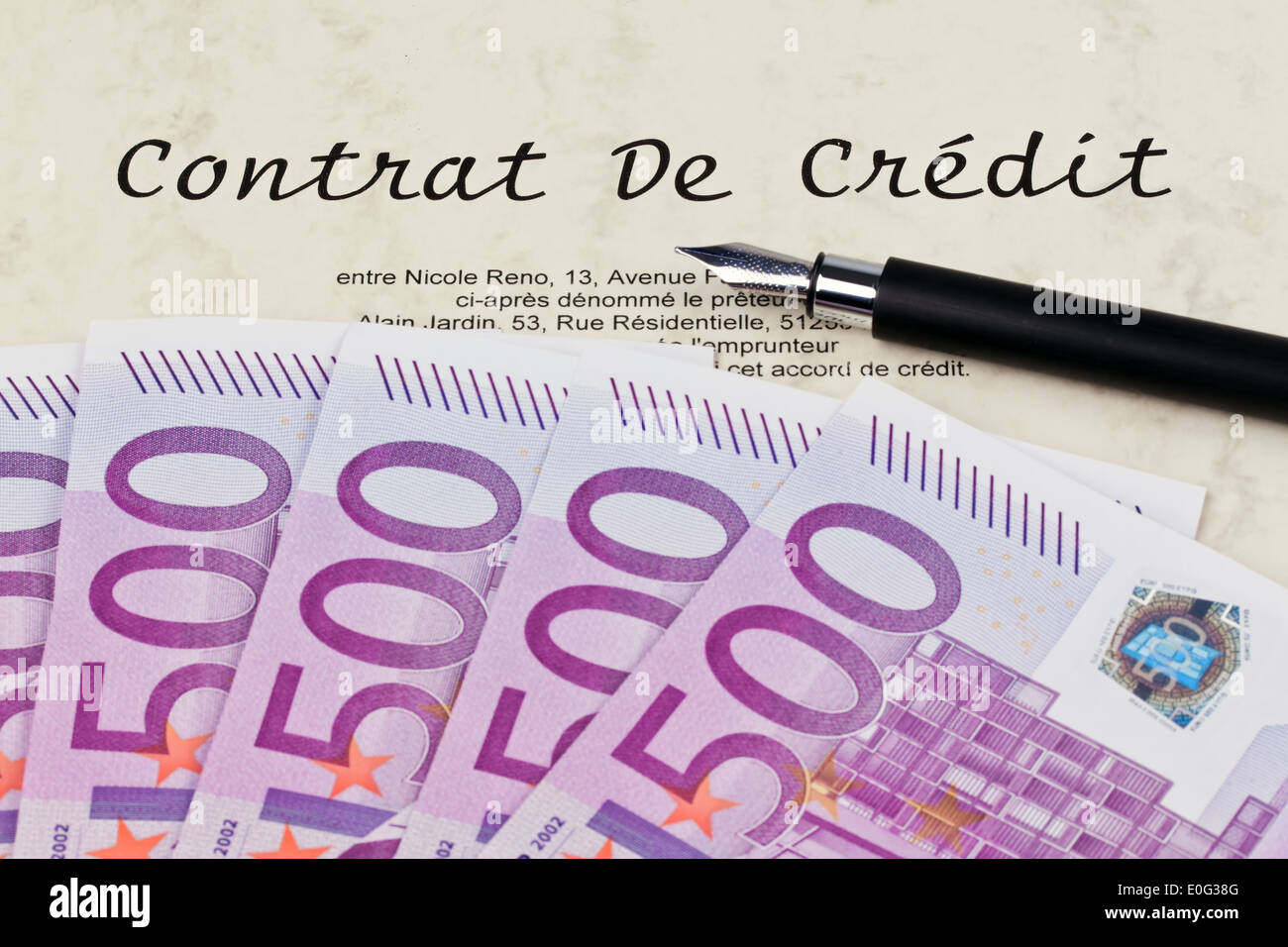 A lot of euro of bank notes and loan contract (In French), Viele Euro Geldscheine und Kredit Vertrag (Franzoesisch) Stock Photo