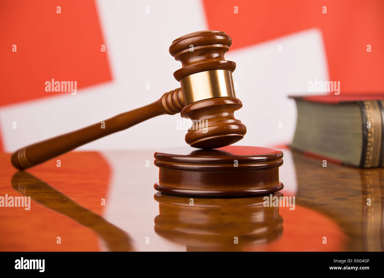 Court hammer and Swiss flag , Gerichtshammer und schweizer Flagge Stock Photo