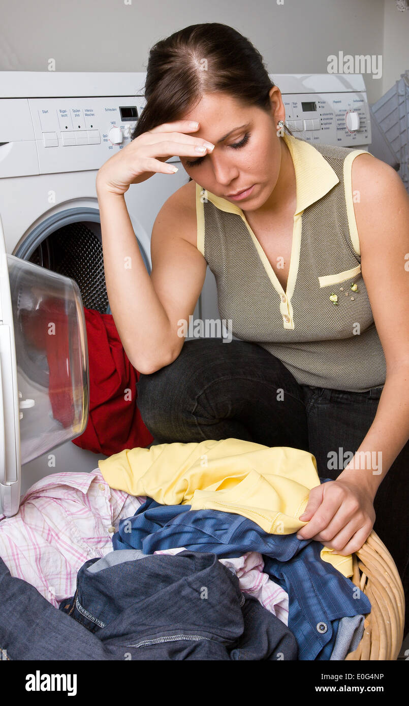 Frustration wash with the laundry , Frust beim Waesche waschen Stock Photo