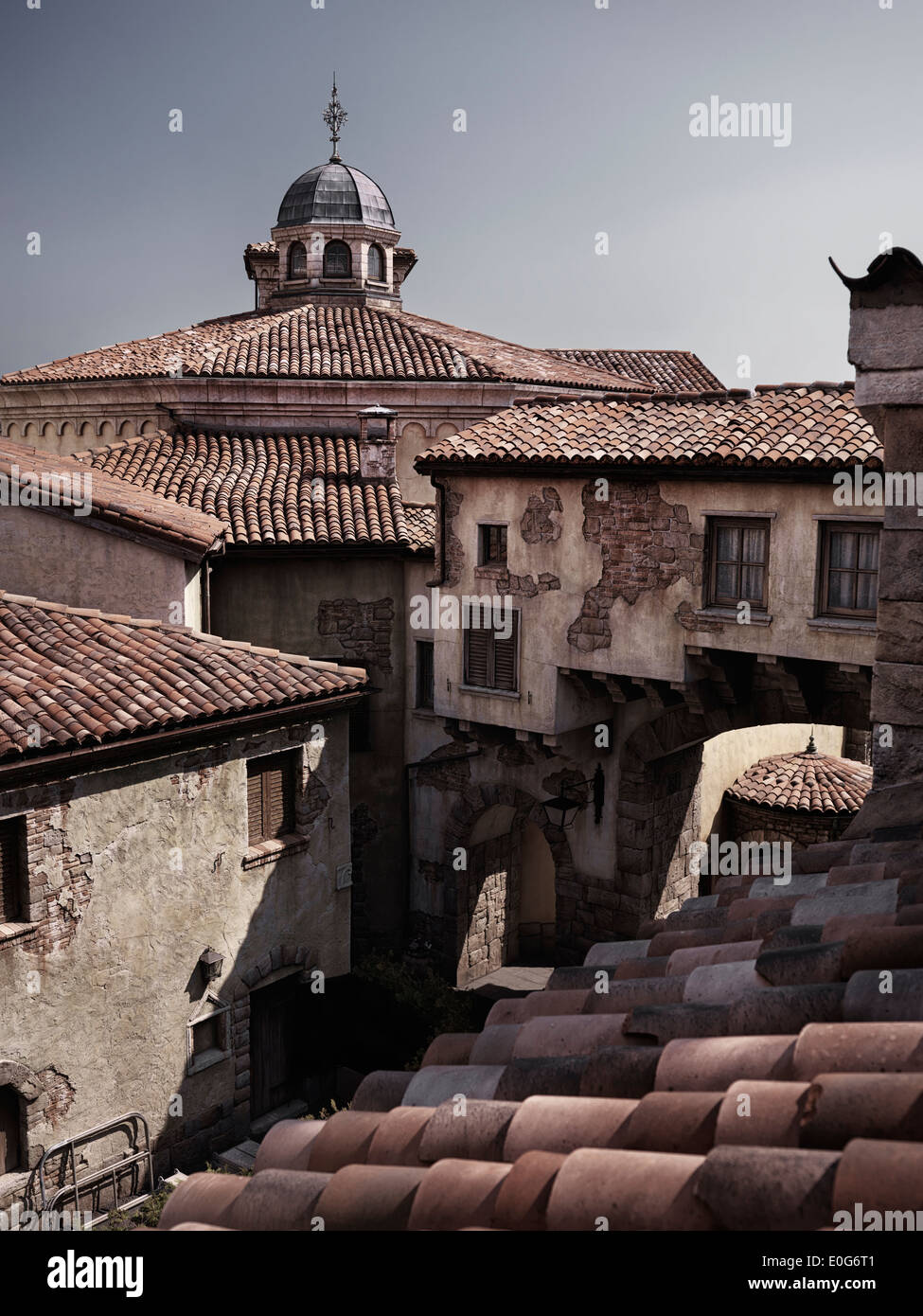 Tiled rooftops of old houses in a town built in Venetian architectural style at Tokyo Disneysea Stock Photo