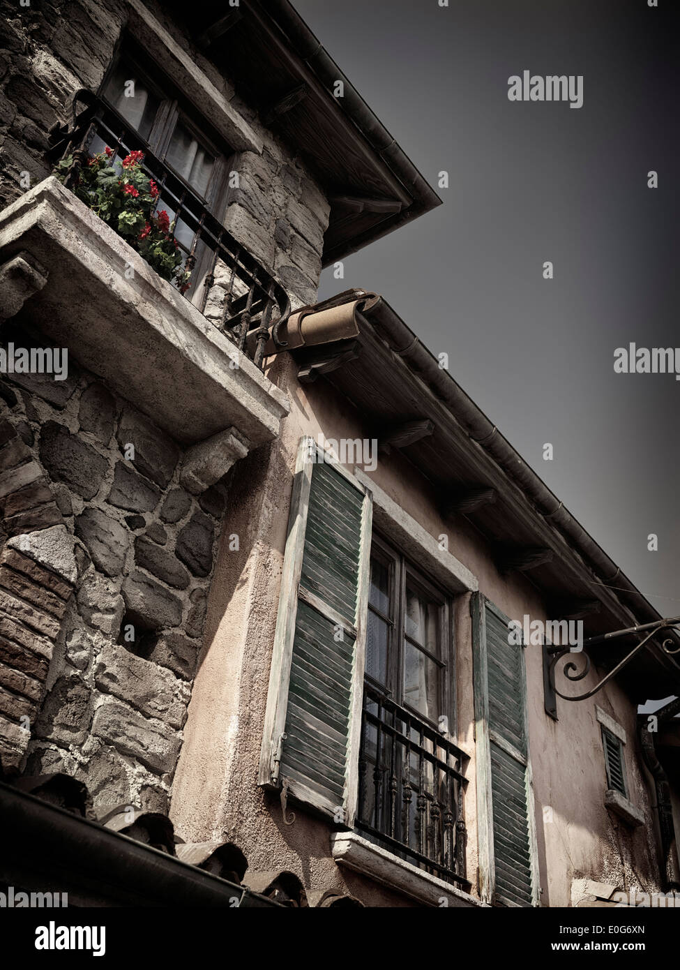 Windows of old houses, antique architecture in Venetian style Stock Photo