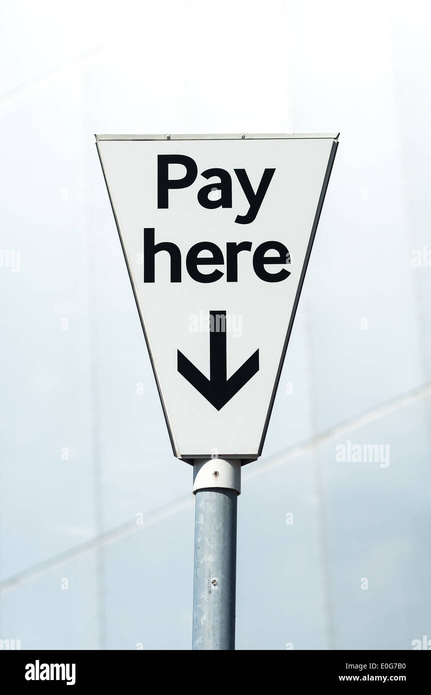 Pay Here sign in a UK pay and display carpark Stock Photo