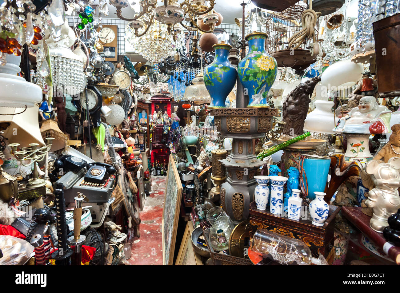 Cluttered junk shop at Upper Lascar Row antique market, Hong Kong Stock Photo