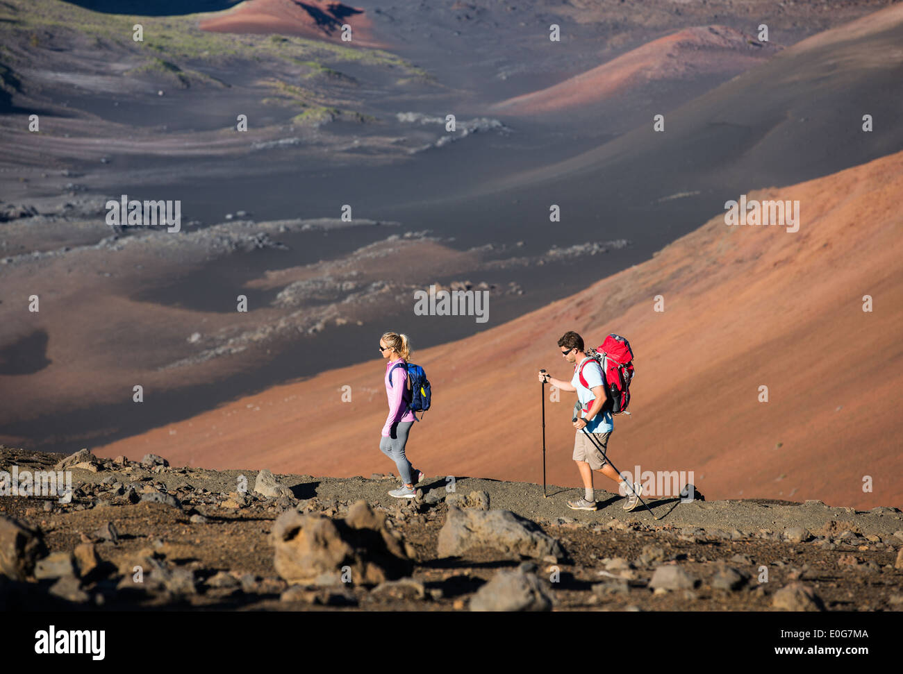 Happy man woman hiking mountains hi-res stock photography and images ...