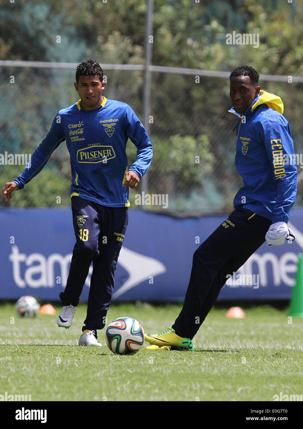 Quito, Ecuador. 12th May, 2014. Ecuador's national soccer team players Joao Rojas (L) and Jaime Ayovi take part in a training session, at the House of the National Team, in Quito, capital of Ecuador, on May 12, 2014. Ecuador's national soccer team players are preparing for the friendly match against the Netherlands, before the 2014 Brazil World Cup. © Santiago Armas/Xinhua/Alamy Live News Stock Photo
