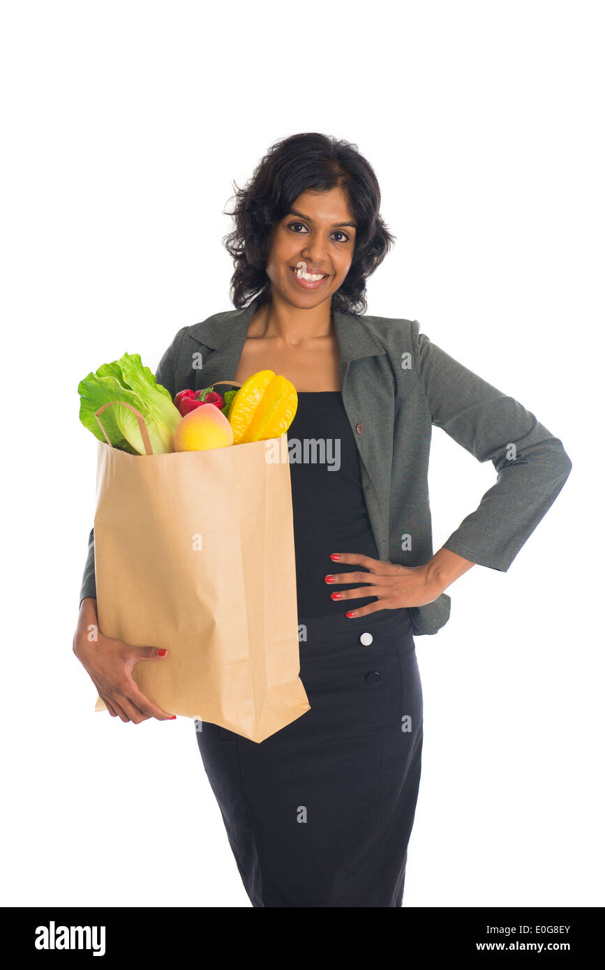 indian female shopping with business attire and white background Stock Photo