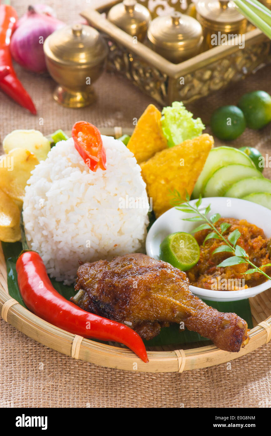 indonesian fried chicken rice Stock Photo - Alamy