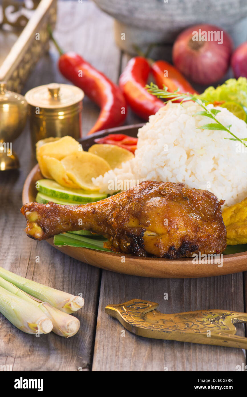 indonesian fried chicken rice Stock Photo - Alamy