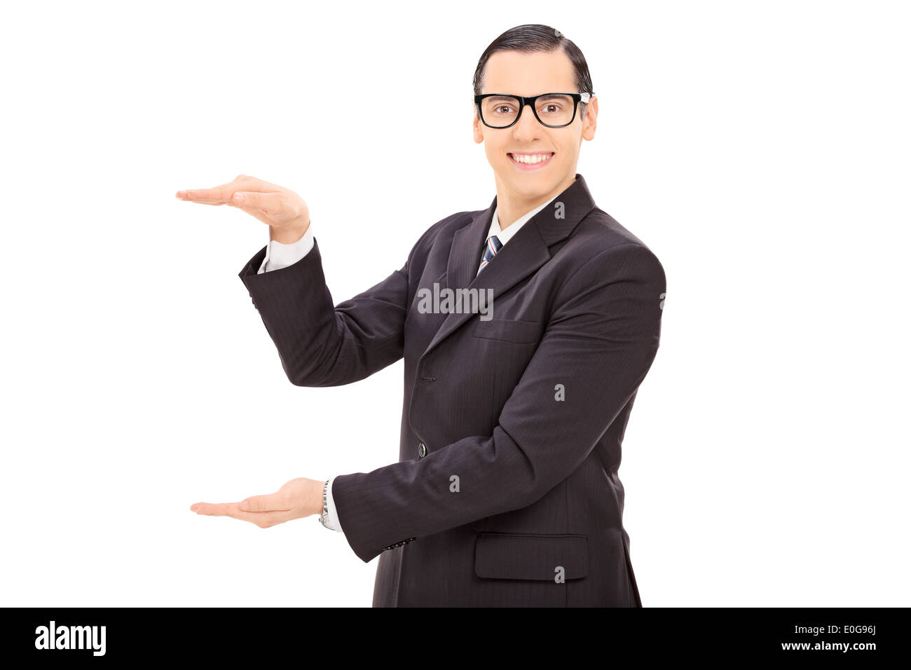 Businessman mimicking with hands Stock Photo
