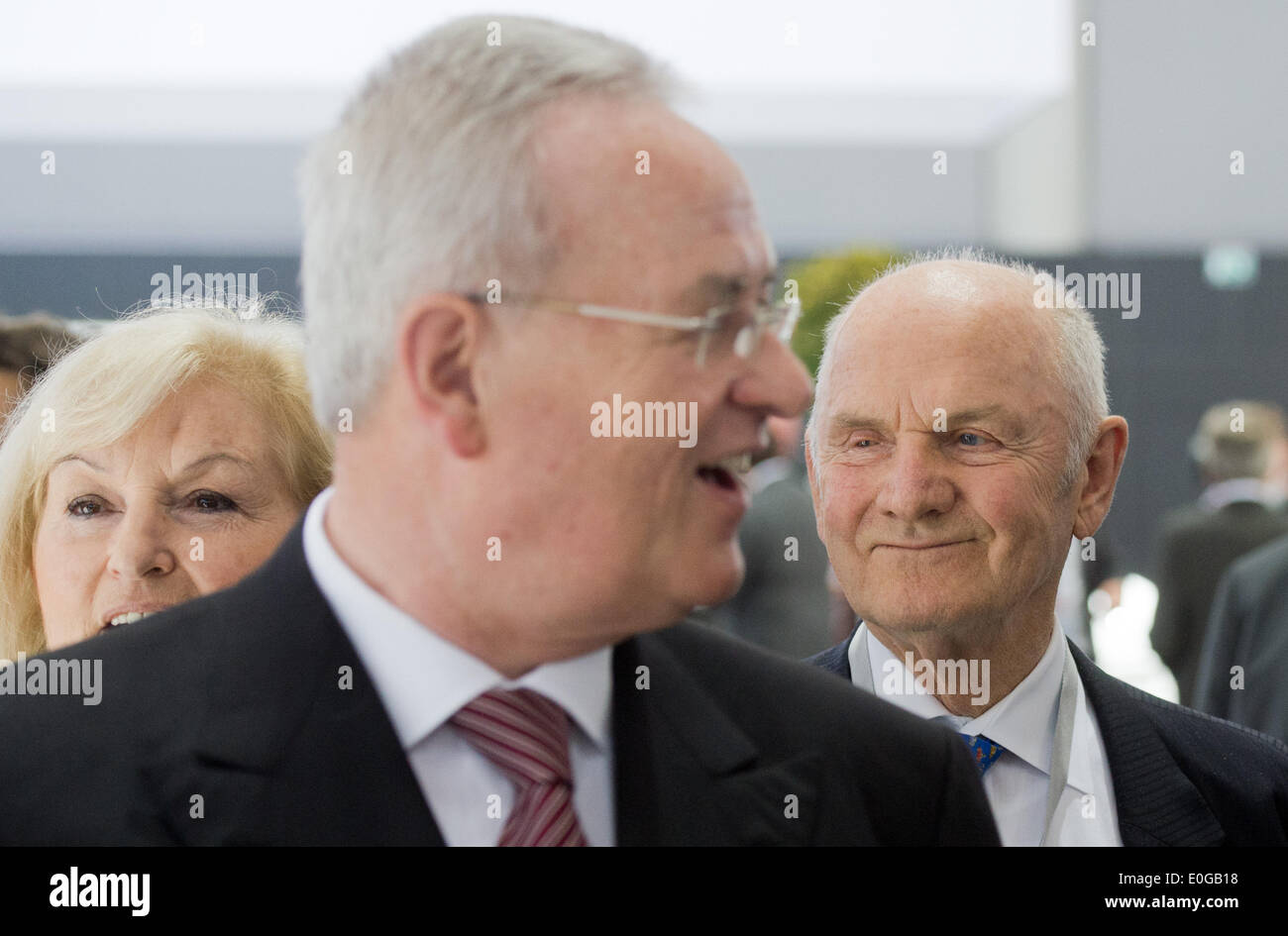 Hanover, Germany. 13th May, 2014. Chairman of the Board of Management (CEO) of Volkswagen AG Martin Winterkorn (L), chairman of the supervisory board of Volkswagen AG Ferdinand Piech and his wife and member of the supervisory board of Volkswagen AG Ursula Piech arrive at at the annual general meeting of Volkswagen AG at the trade fair grounds in Hanover, Germany, 13 May 2014. Photo: JULIAN STRATENSCHULTE/DPA/Alamy Live News Stock Photo