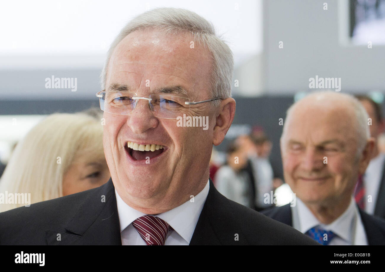 Hanover, Germany. 13th May, 2014. Chairman of the Board of Management (CEO) of Volkswagen AG Martin Winterkorn (L), chairman of the supervisory board of Volkswagen AG Ferdinand Piech and his wife and member of the supervisory board of Volkswagen AG Ursula Piech arrive at at the annual general meeting of Volkswagen Group at the trade fair grounds in Hanover, Germany, 13 May 2014. Photo: JULIAN STRATENSCHULTE/DPA/Alamy Live News Stock Photo