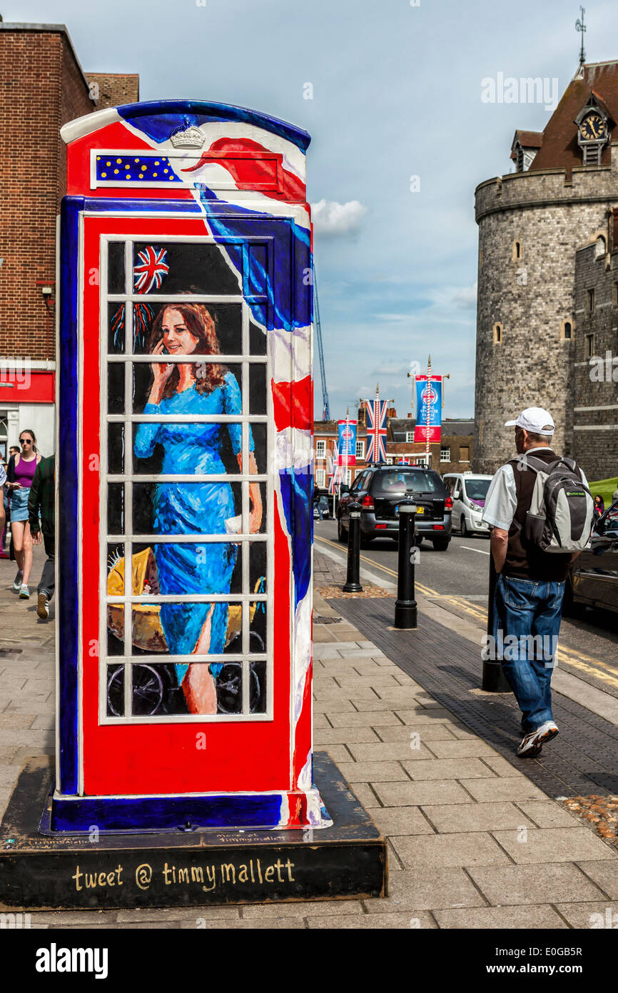 Duchess of Cambridge with pram and Union Flag in the 'Ring a Royal' Phone Box by artist Timmy Mallett Windsor, Berkshire, UK Stock Photo