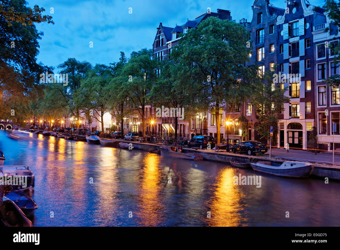 Amsterdam canal in the evening light of dusk. Stock Photo