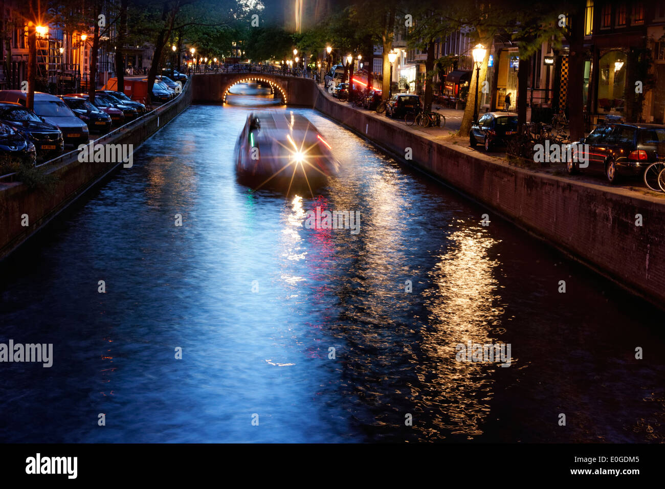 Amsterdam canal in the evening light of dusk. Stock Photo