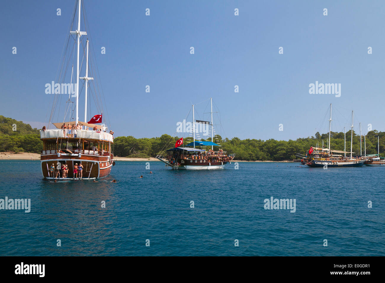 Tourist boats in the bay of the ancient citiy of Phaselis, Lycian coast, Lycia, Mediterranean, Antalya, Turkey, Asia Stock Photo