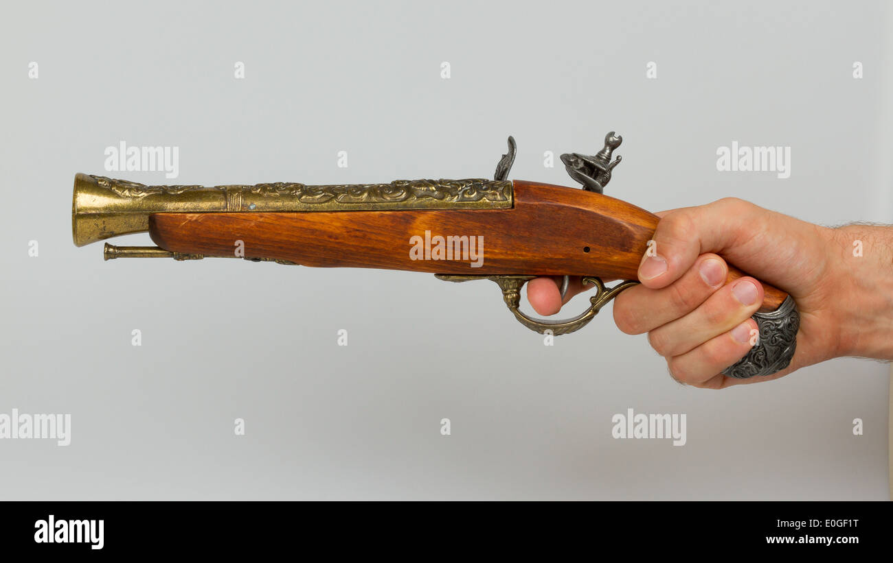 Old wooden gun isolated on white background Stock Photo - Alamy