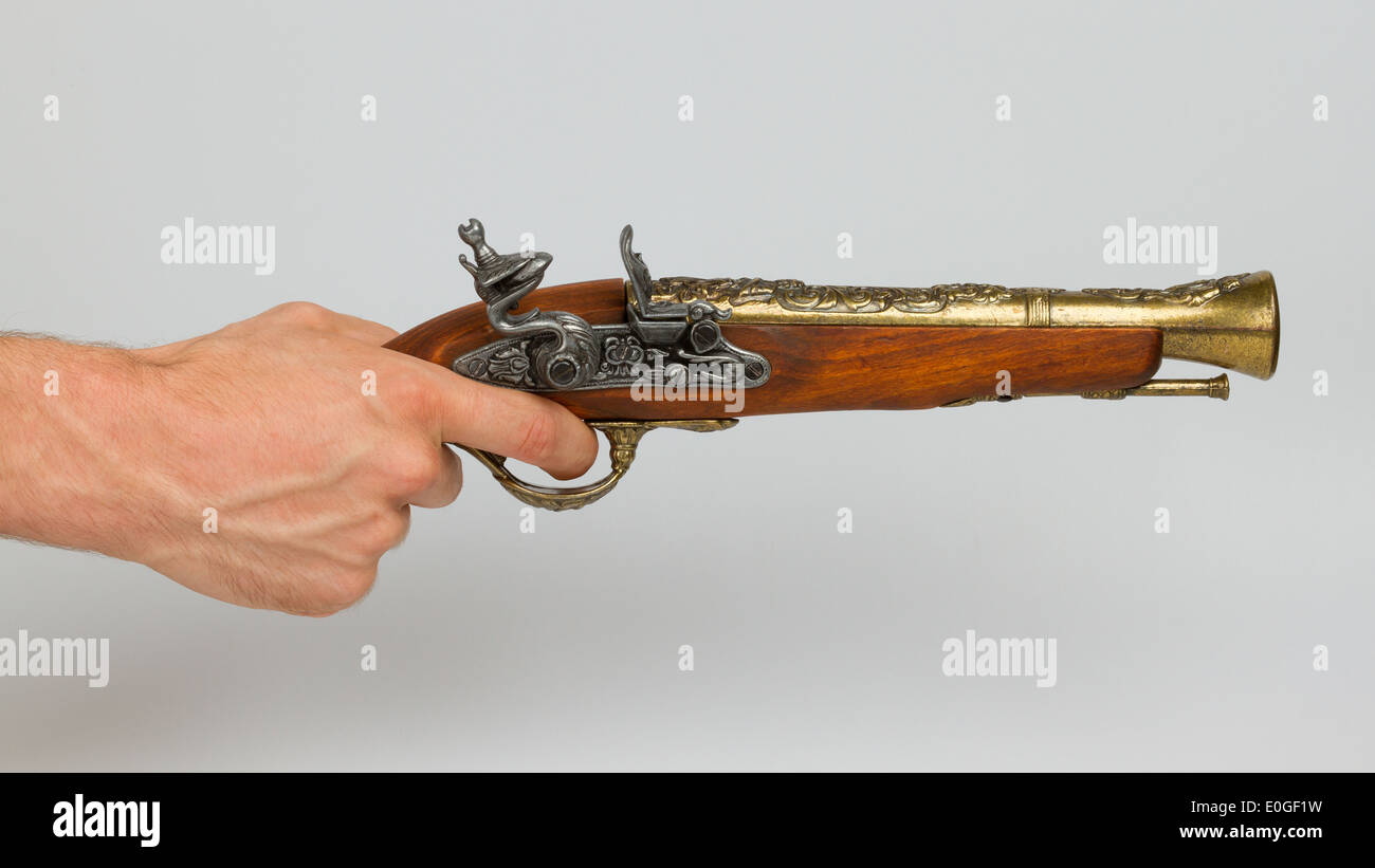 Old wooden gun isolated on white background Stock Photo - Alamy
