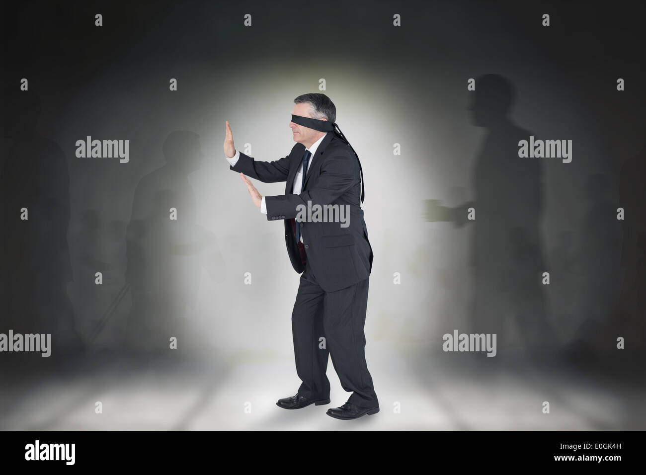 Young Woman Wearing Black Blindfold Isolated On Grey Stock Photo