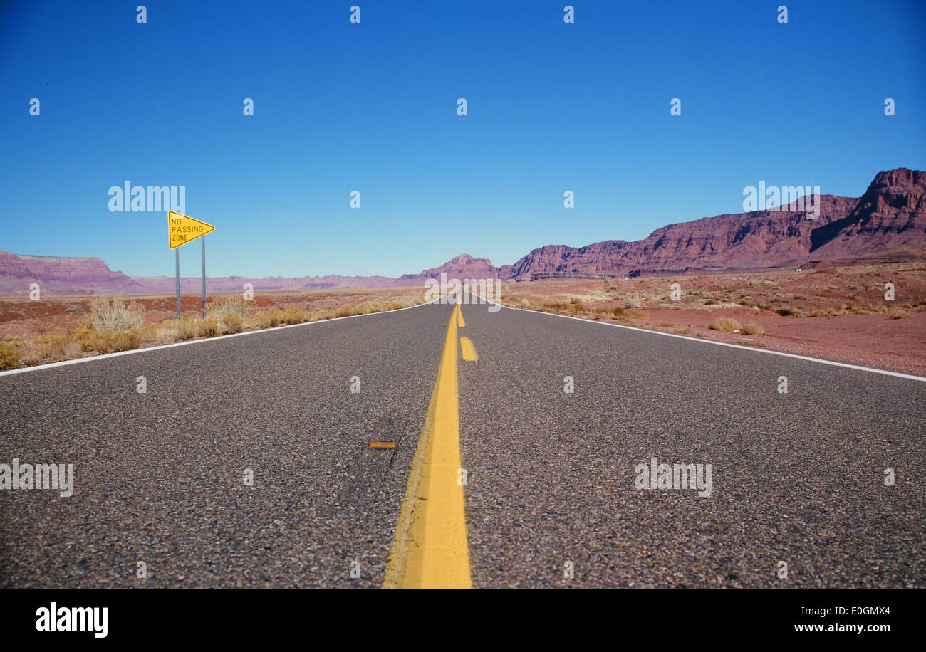 No passing zone on empty highway in Arizona, U.S.A Stock Photo