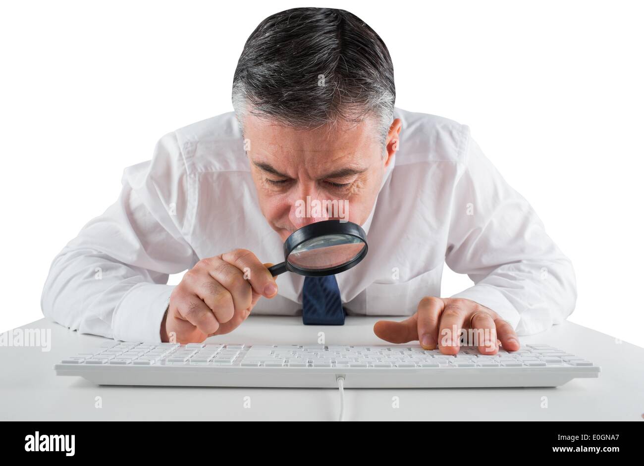 Mature Businessman Examining With Magnifying Glass Stock Photo Alamy