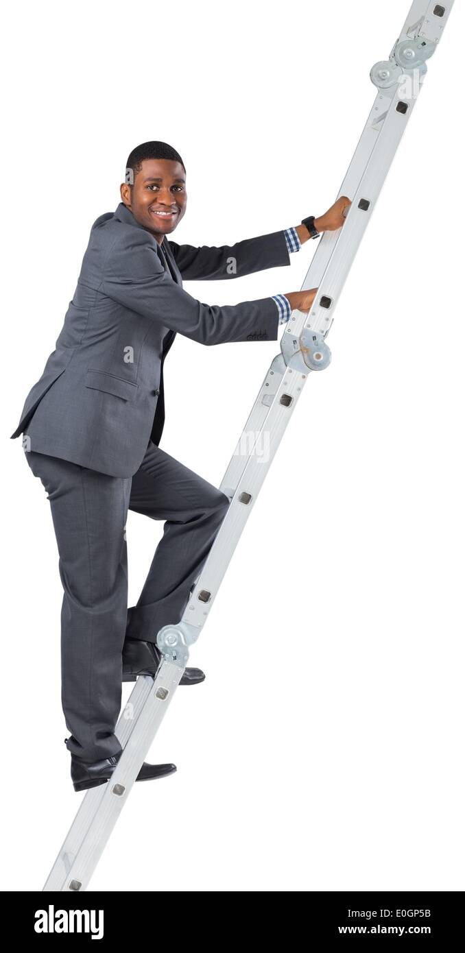 Businessman climbing up ladder Stock Photo Alamy