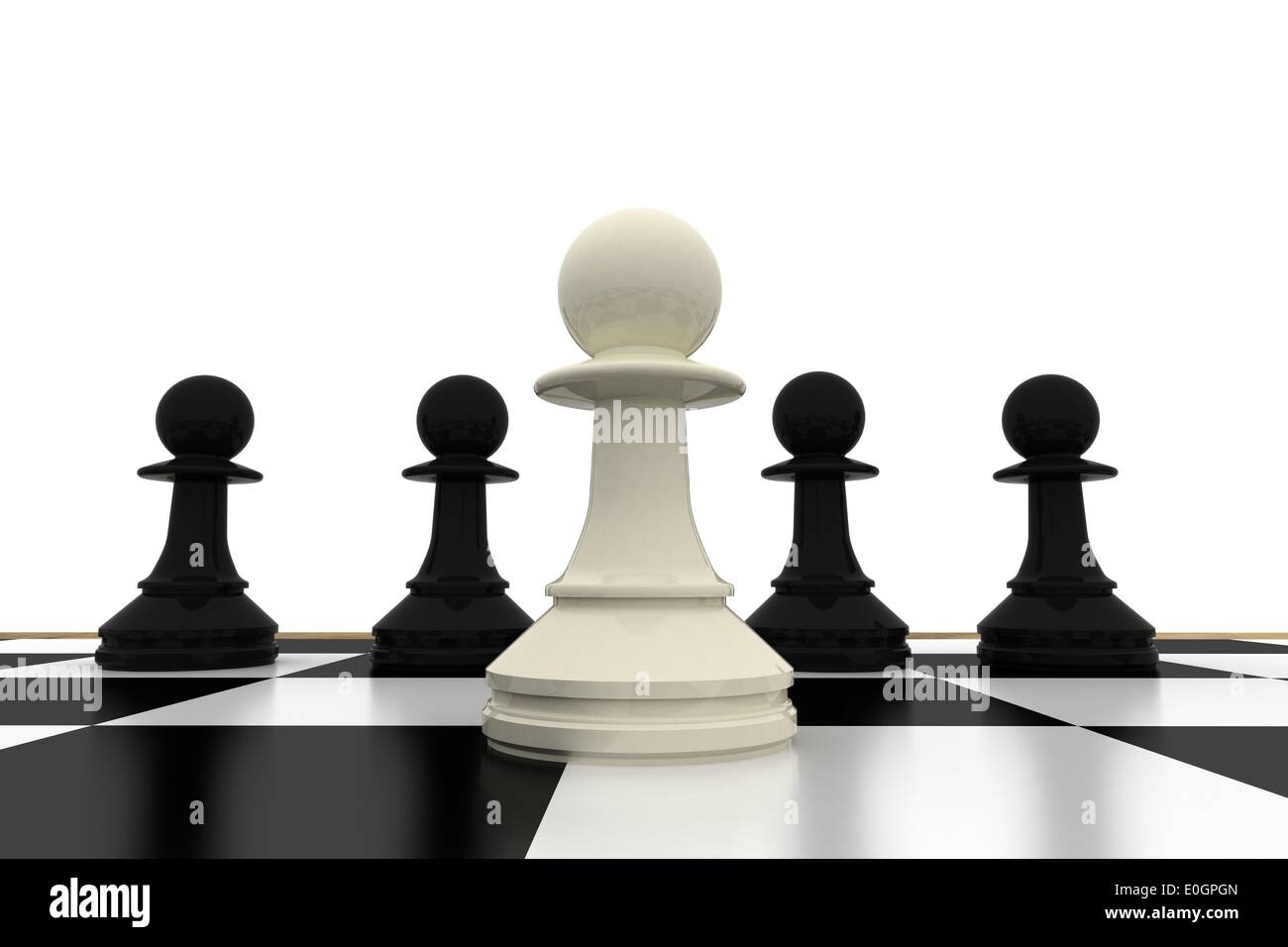 White pawn standing with black pawns Stock Photo