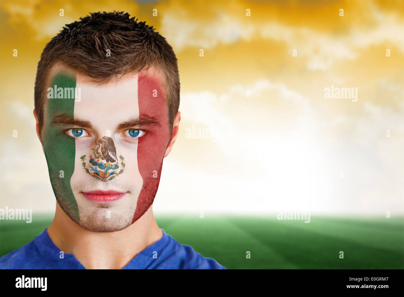 Mexico football fan in face paint Stock Photo - Alamy