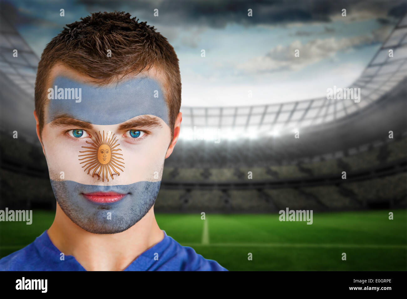 Argentina football fan in face paint Stock Photo Alamy