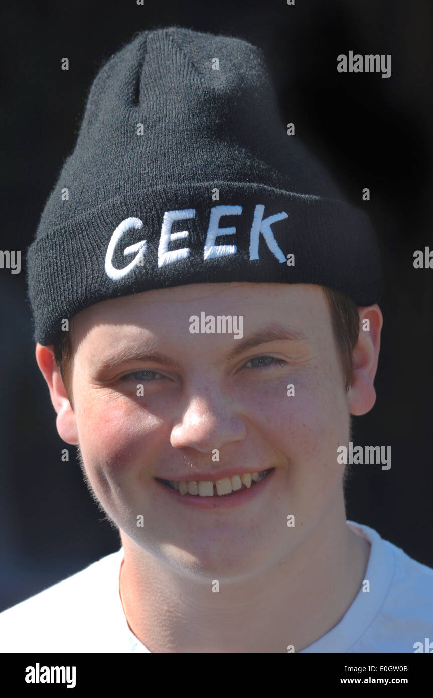 Teenager Wearing A GEEK Hat. Stock Photo