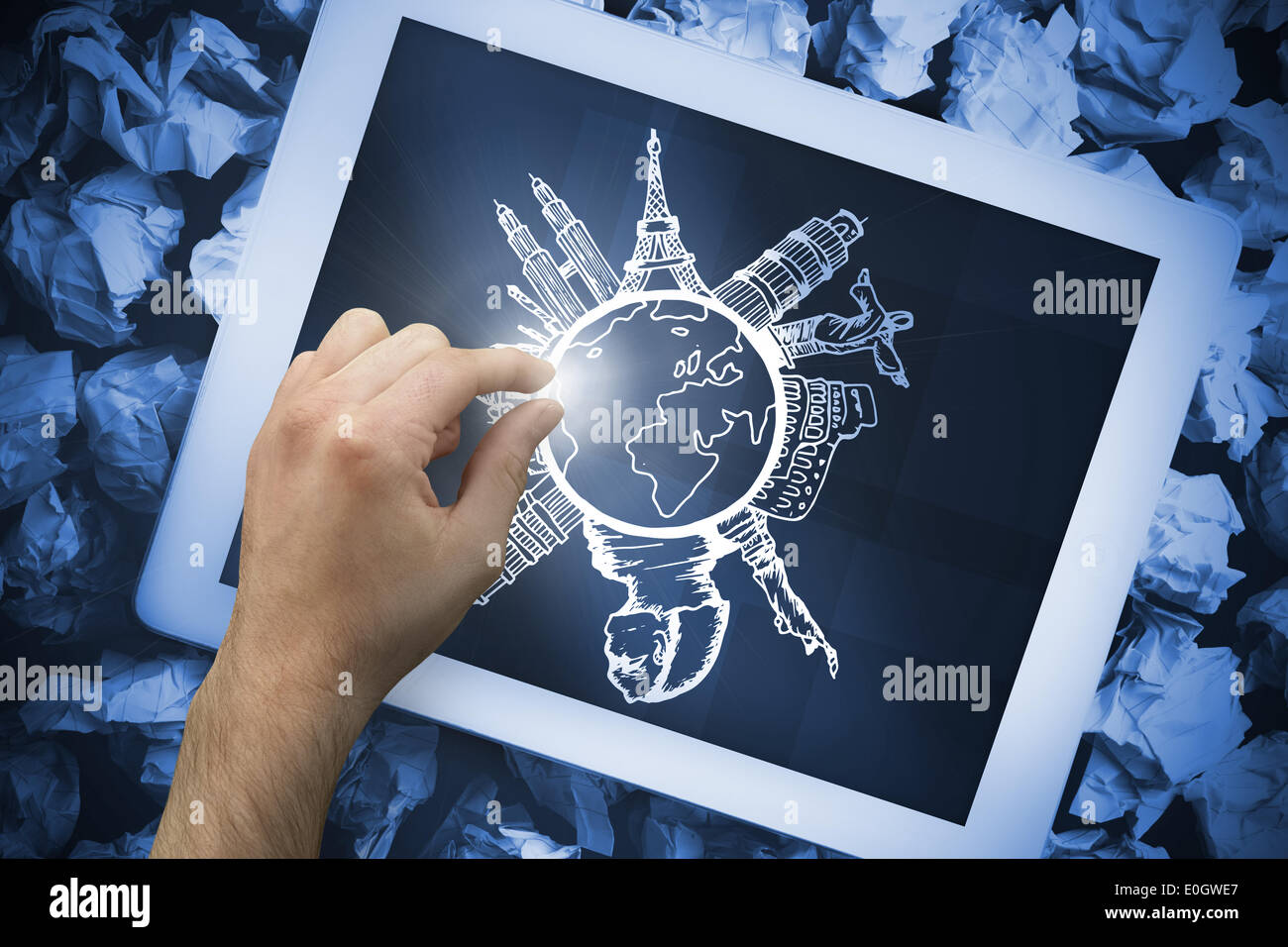 Composite image of hand touching tablet Stock Photo