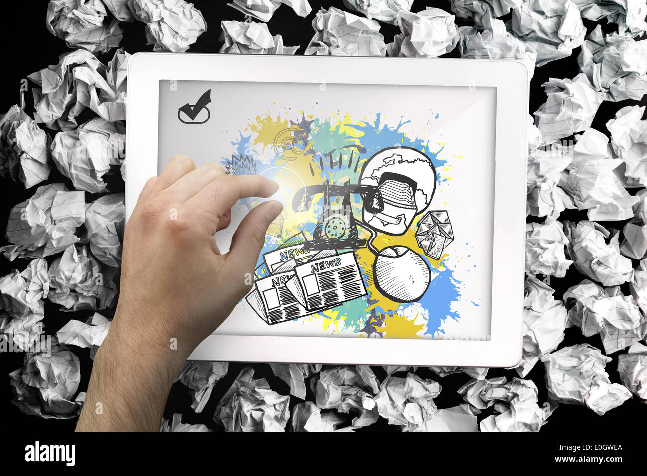 Composite image of hand touching tablet Stock Photo