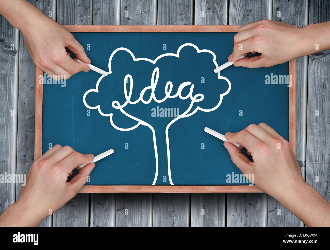 Composite Image Of Multiple Hands Drawing Idea Tree With Chalk Stock Composite Image Of Multiple Hands Drawing Idea Tree With Chalk Stock