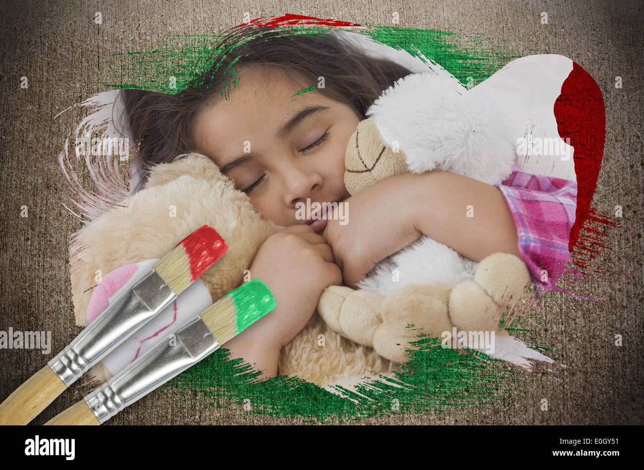 Composite image of little girl cuddling teddys Stock Photo