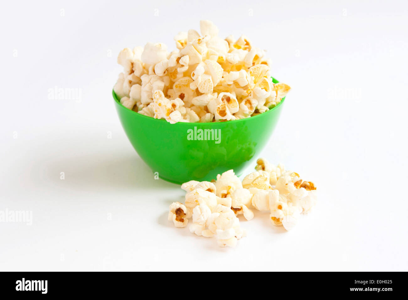 Popcorn in green bowl Stock Photo