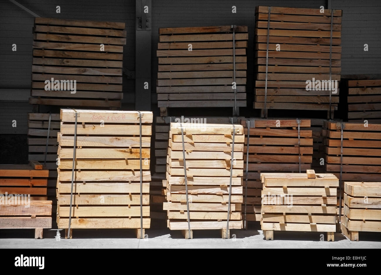 Empty industrial pallets in a factory depot Stock Photo