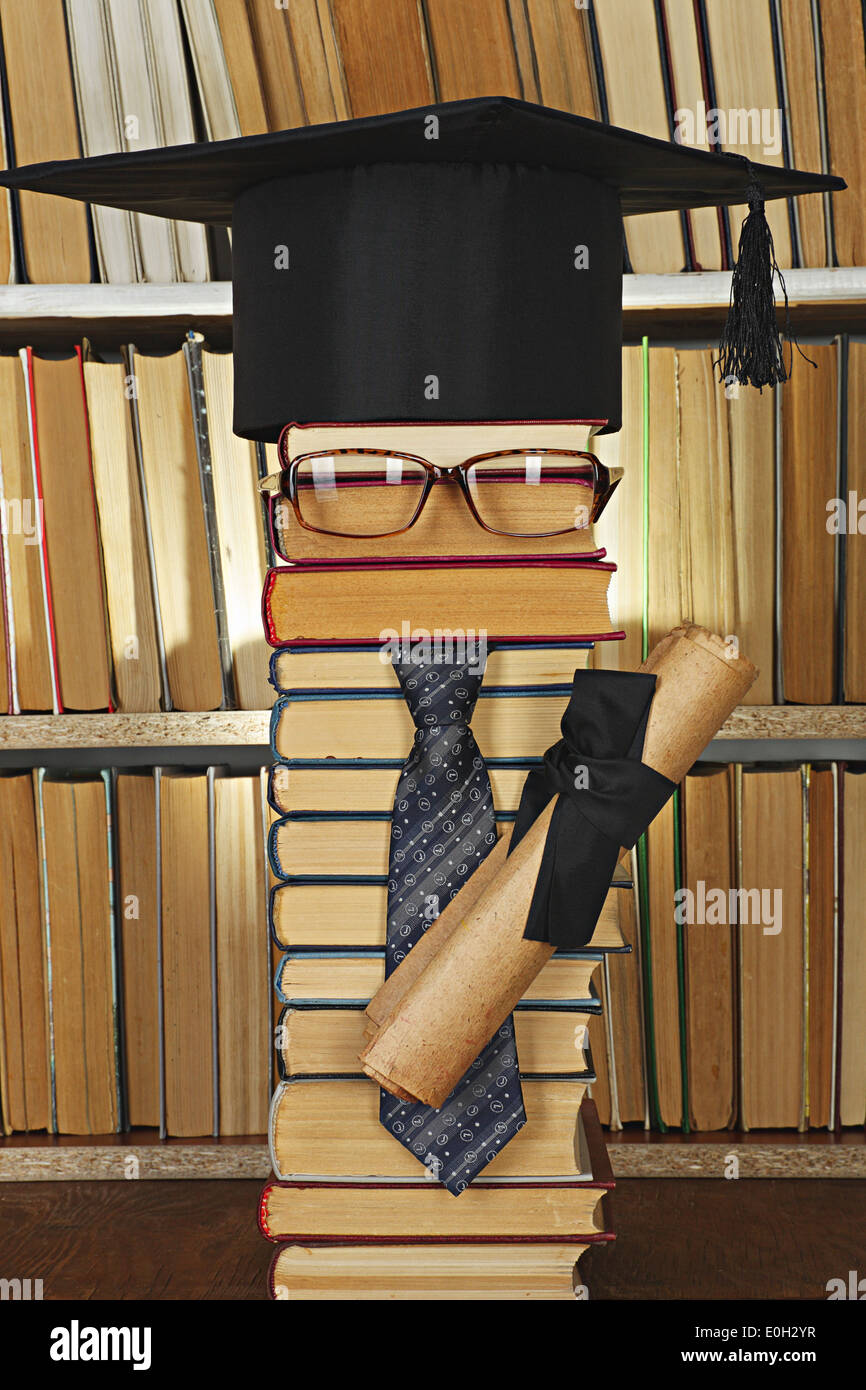 Education concept. Forged student from books in library Stock Photo