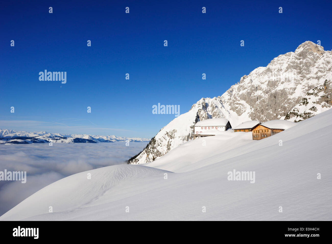 Hut Gruttenhuette in snow, Wilder Kaiser, Kaiser mountain range, Tyrol, Austria Stock Photo