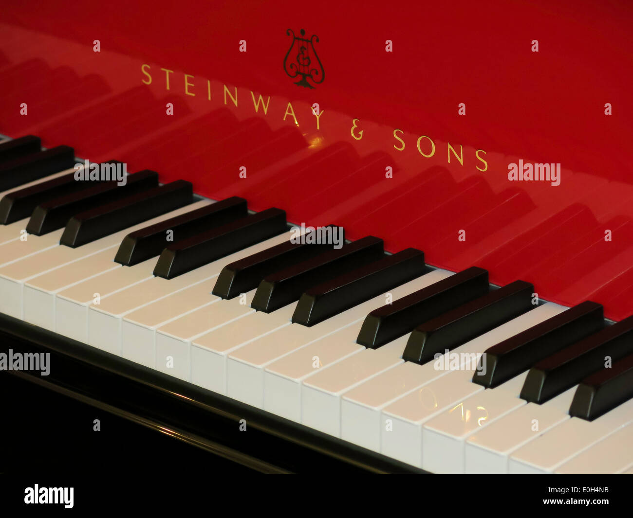 Red Piano in Steinway and Sons Showroom, NYC, USA Stock Photo