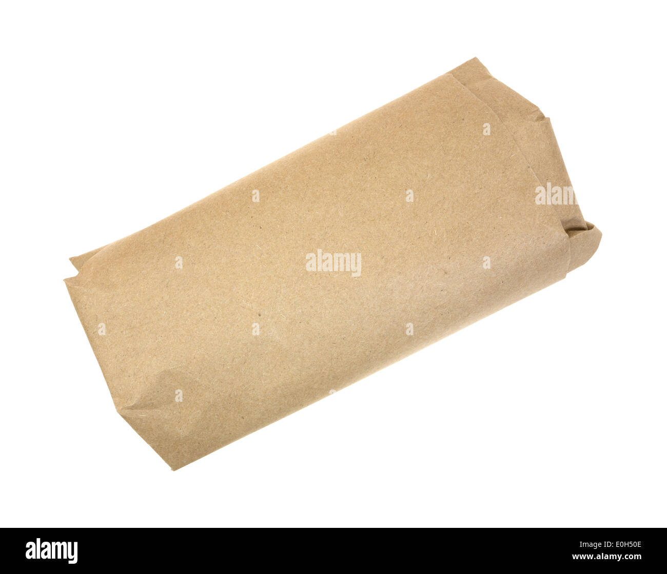 A serving of butchers meat wrapped in brown paper. Stock Photo