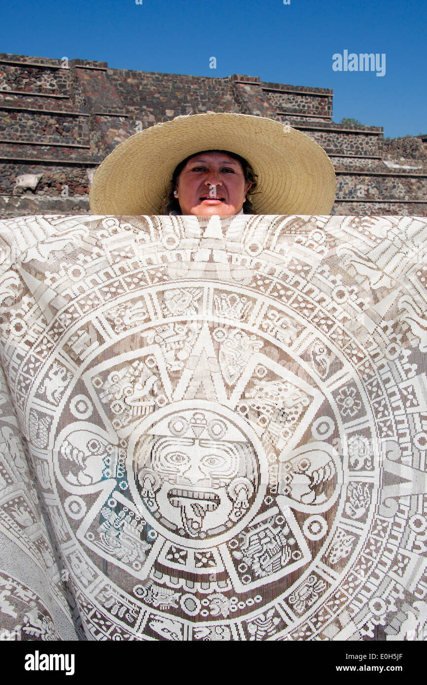 Woman trader displaying circular table cloth Teotihuacan Mexico Stock Photo
