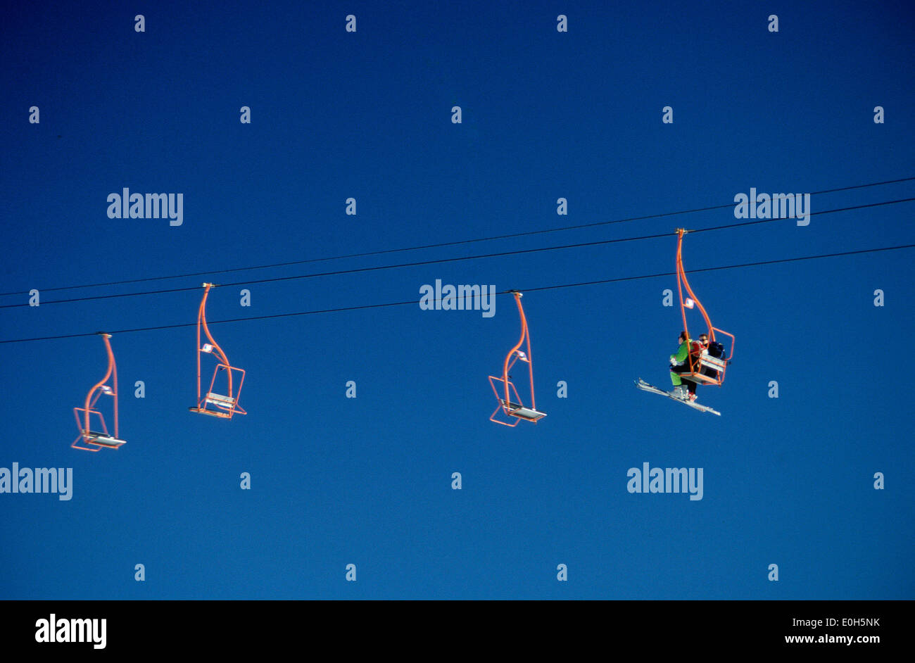 Chairlift at a ski resort Stock Photo Alamy