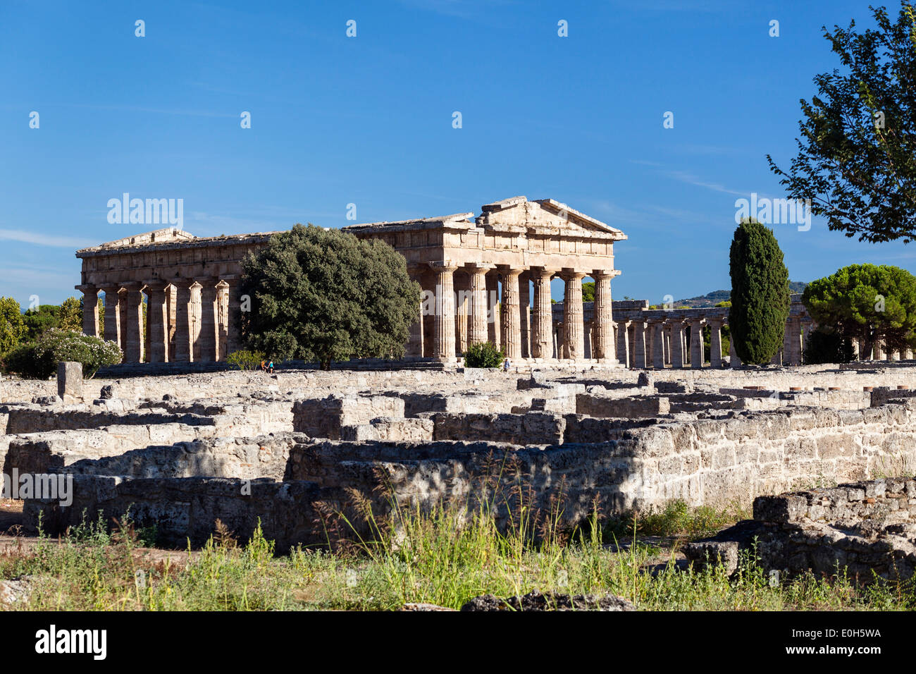 Poseidon Temple, Neptune Temple and Basilica, living quarters, historic town of Paestum in the Gulf of Salerno, Capaccio, Campan Stock Photo