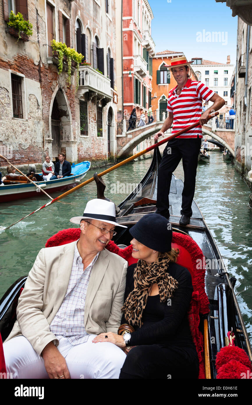 Couple in a gondola, Gondola in the canals of Venice, Venetia, Italy, Europe Stock Photo