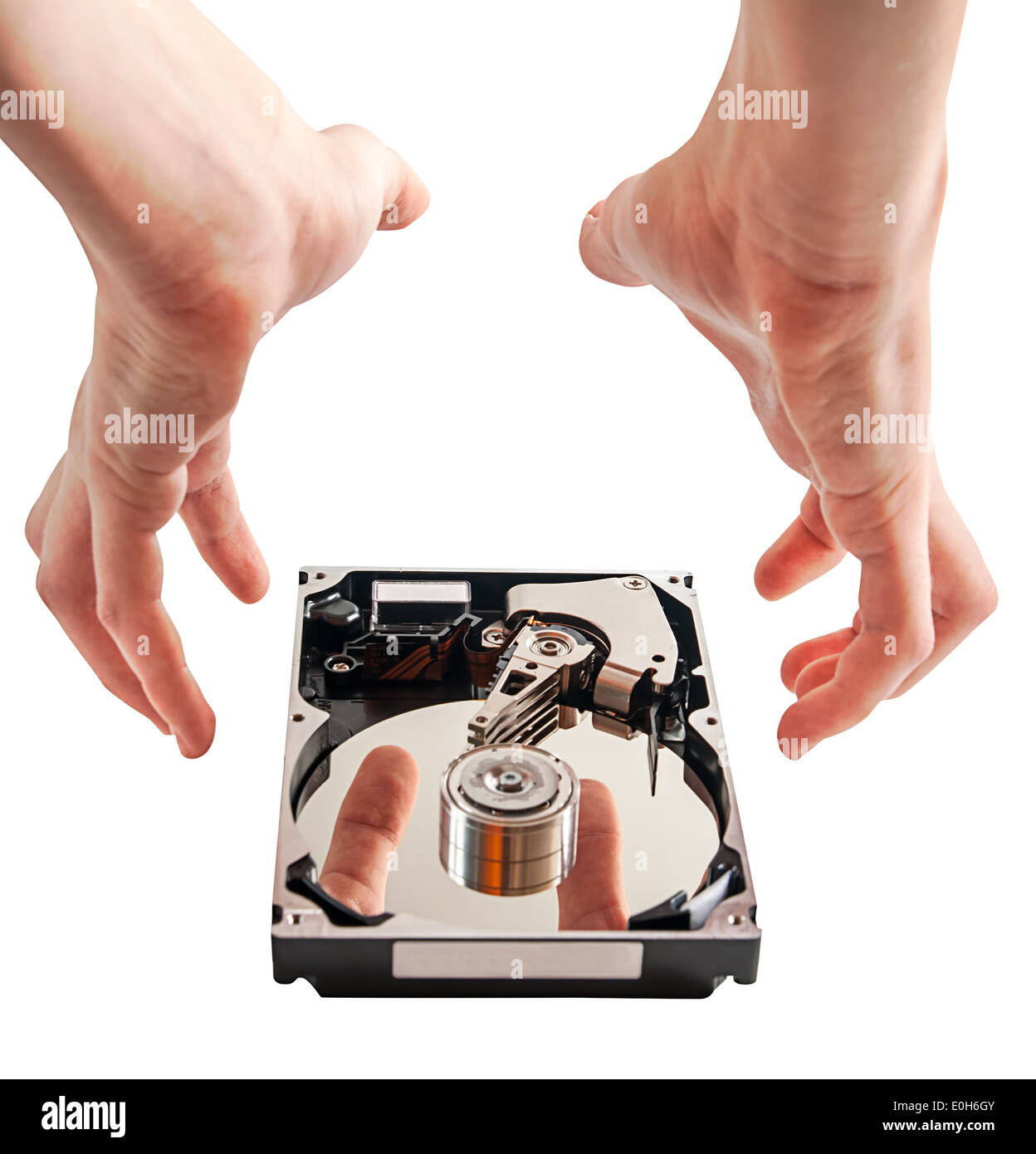 Hard drive details and hands, concept of data security, on a white