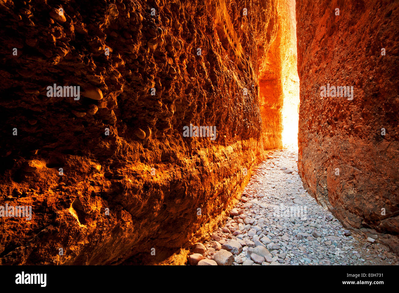 Sun-illuminated walls of Echidna Chasm in Purnululu National Park. Stock Photo