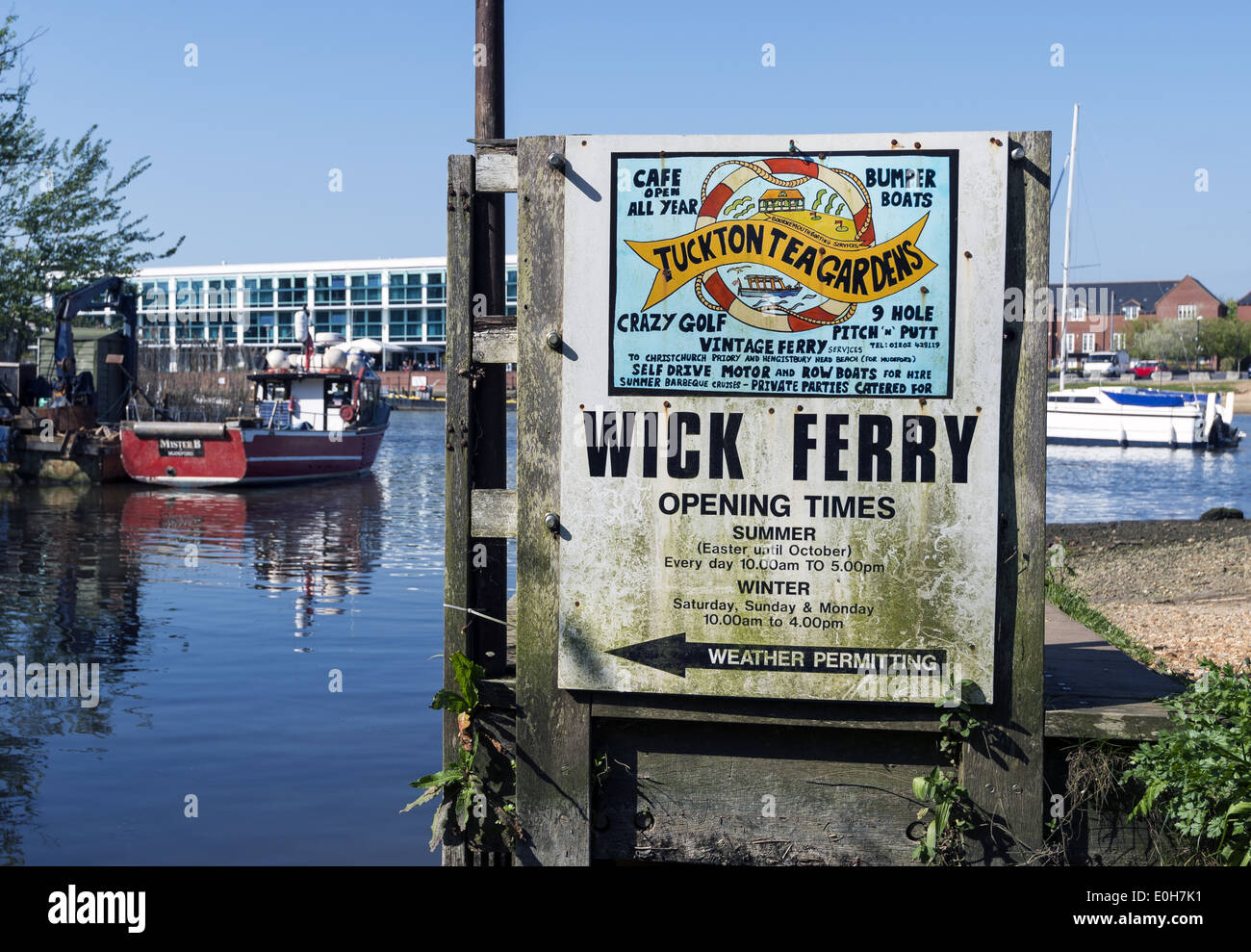 The Wick ferry pick up point and the Captains Club Hotel on Christchurch Harbour in Dorset England UK Stock Photo