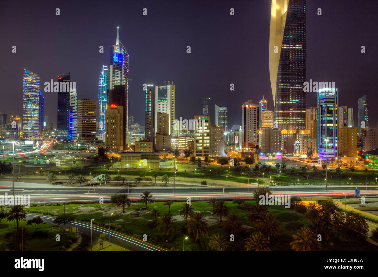 Arabian Peninsula, Kuwait, city skyline and central business district, elevated view at night Stock Photo