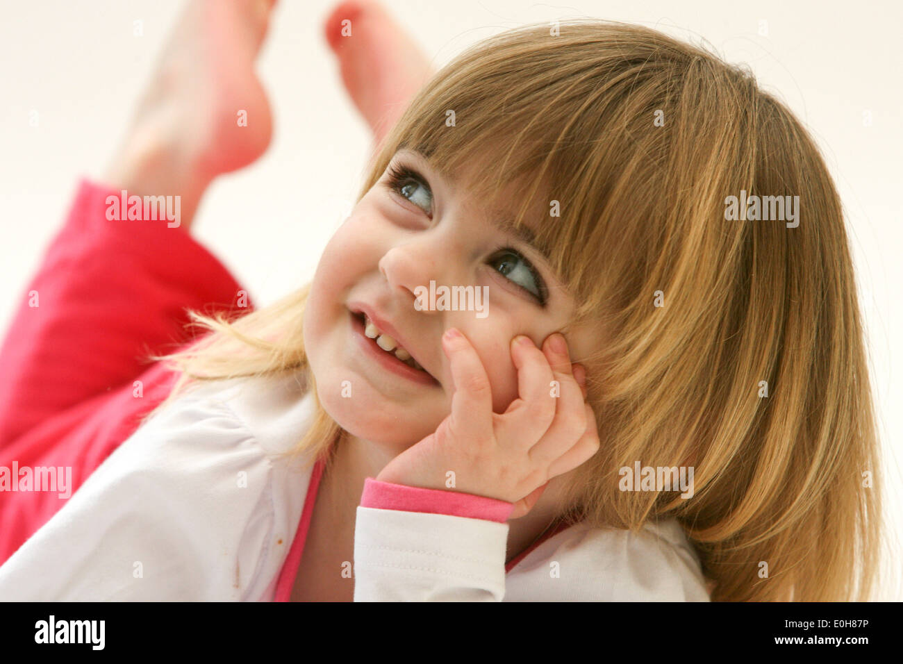 FOUR YEAR OLD GIRL PULLING FACES Stock Photo Alamy